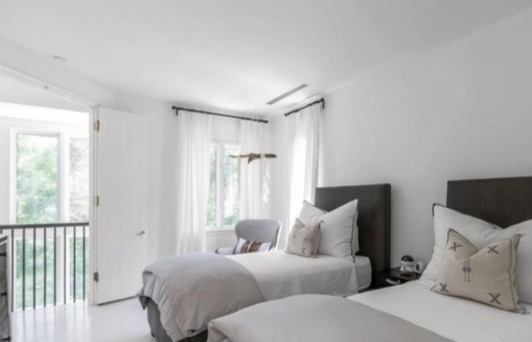 Bright twin guest room in white and dove grey